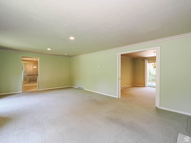 4893 S Regency St, Holladay, UT 84117 - spare room with ornamental molding, light colored carpet, and recessed lighting