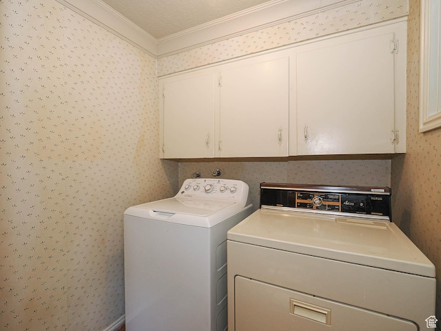 4893 S Regency St, Holladay, UT 84117 - laundry area featuring wallpapered walls, cabinet space, washing machine and clothes dryer, and ornamental molding