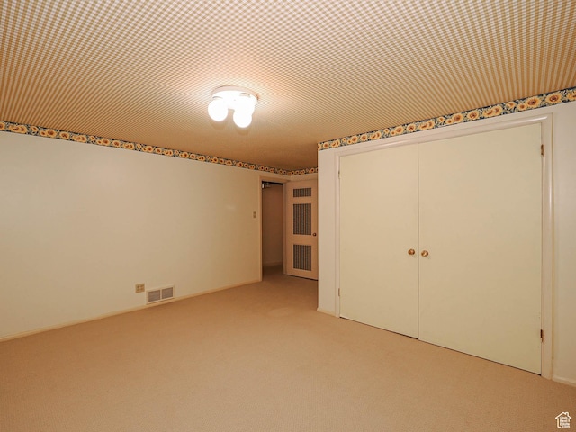 4893 S Regency St, Holladay, UT 84117 - unfurnished bedroom featuring a closet and light carpet