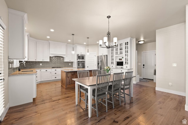 13571 S Meadow Heights Ln, Draper, UT 84020 - kitchen with appliances with stainless steel finishes, a center island, a chandelier, recessed lighting, and white cabinetry