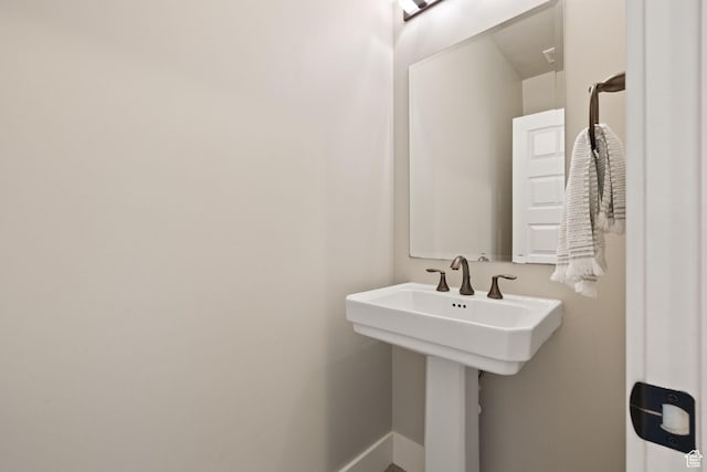 13571 S Meadow Heights Ln, Draper, UT 84020 - bathroom with baseboards and a sink