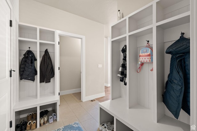 13571 S Meadow Heights Ln, Draper, UT 84020 - mudroom with light tile patterned flooring and baseboards