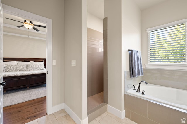 13571 S Meadow Heights Ln, Draper, UT 84020 - ensuite bathroom featuring a garden tub, walk in shower, ceiling fan, and tile patterned floors