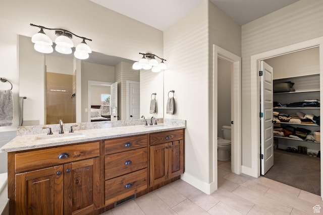 13571 S Meadow Heights Ln, Draper, UT 84020 - full bathroom with double vanity, ensuite bath, a shower, and a spacious closet