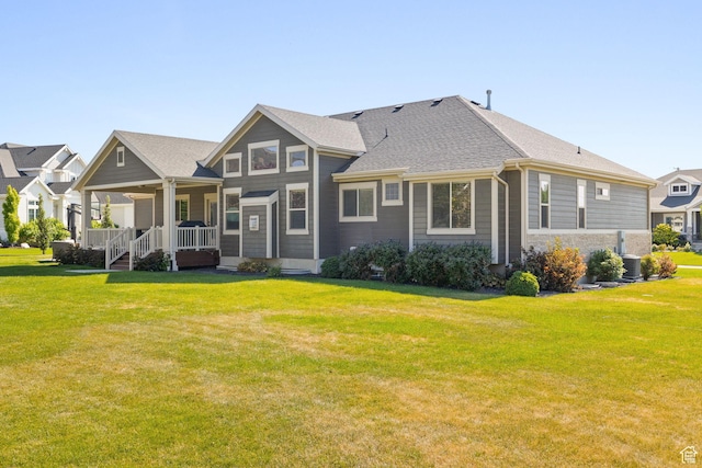 13571 S Meadow Heights Ln, Draper, UT 84020 - rear view of property with covered porch, a lawn, and a shingled roof