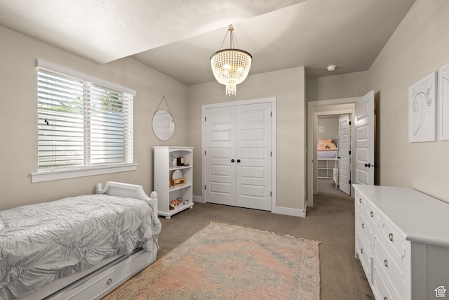 13571 S Meadow Heights Ln, Draper, UT 84020 - bedroom with carpet flooring, a chandelier, and a closet