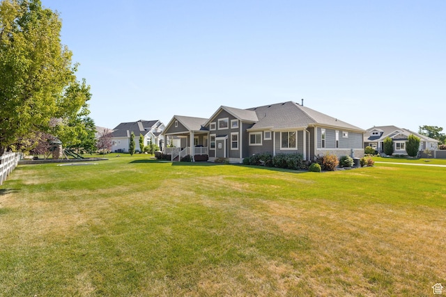 13571 S Meadow Heights Ln, Draper, UT 84020 - back of house with a lawn, a porch, and a residential view