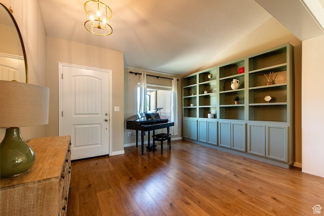 552 E Sunset Stream Way, Draper, UT 84020 - foyer with hardwood / wood-style floors, a chandelier, and vaulted ceiling
