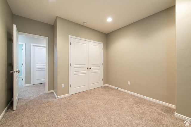 552 E Sunset Stream Way, Draper, UT 84020 - unfurnished bedroom featuring carpet flooring, a closet, and recessed lighting