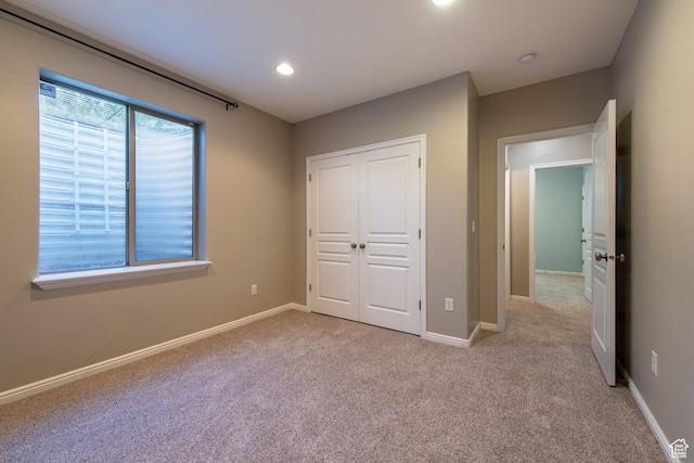 552 E Sunset Stream Way, Draper, UT 84020 - unfurnished bedroom featuring light colored carpet, a closet, and recessed lighting