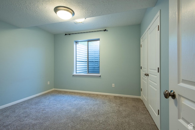 552 E Sunset Stream Way, Draper, UT 84020 - unfurnished bedroom with carpet floors, a textured ceiling, and a closet