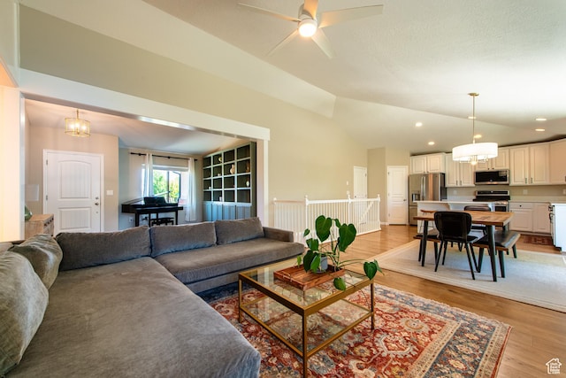 552 E Sunset Stream Way, Draper, UT 84020 - living area featuring vaulted ceiling, light wood-style floors, ceiling fan, and recessed lighting