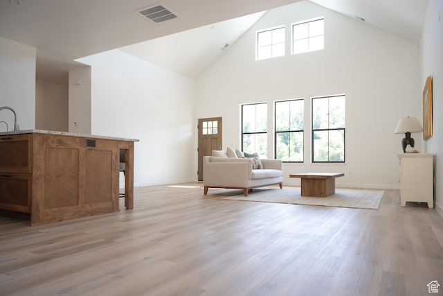 2640 W State Road 32, Peoa, UT 84061 - living room featuring high vaulted ceiling and light wood-style flooring