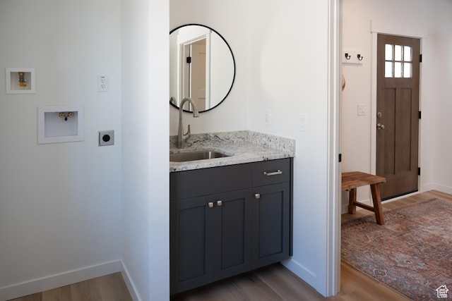 2640 W State Road 32, Peoa, UT 84061 - laundry area featuring hookup for a washing machine, hookup for an electric dryer, wood finished floors, and cabinet space