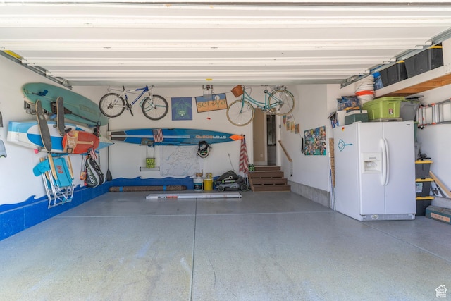 10296 S Salmon Dr, South Jordan, UT 84095 - garage with white fridge with ice dispenser