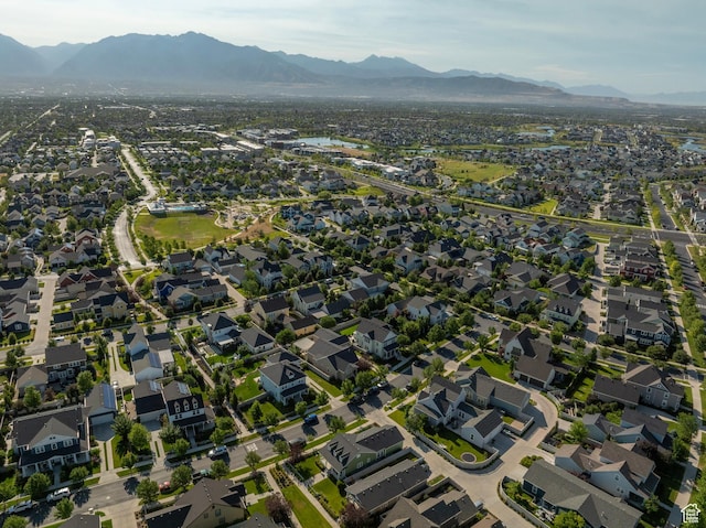 10296 S Salmon Dr, South Jordan, UT 84095 - aerial view of property and surrounding area with a mountain backdrop and nearby suburban area