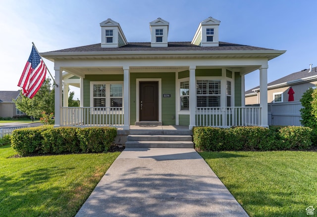 10296 S Salmon Dr, South Jordan, UT 84095 - view of front of home with covered porch and a front yard