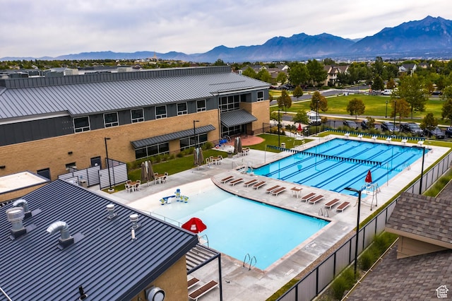 10296 S Salmon Dr, South Jordan, UT 84095 - community pool with a mountain view and a patio