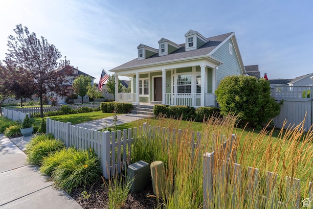 10296 S Salmon Dr, South Jordan, UT 84095 - view of front of property featuring a porch and a fenced front yard