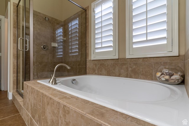 10296 S Salmon Dr, South Jordan, UT 84095 - full bathroom featuring a garden tub, a shower stall, and tile patterned flooring
