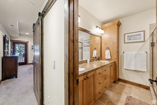 9855 Vista Dr Unit 103, Heber City, UT 84032 - full bath featuring double vanity and stone finish flooring
