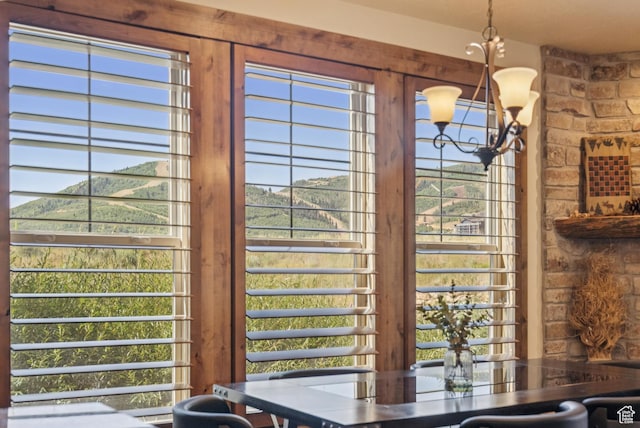 9855 Vista Dr Unit 103, Heber City, UT 84032 - dining area view of a chandelier and a mountain backdrop