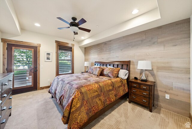 9855 Vista Dr Unit 103, Heber City, UT 84032 - bedroom featuring access to exterior, wooden walls, recessed lighting, light colored carpet, and ceiling fan