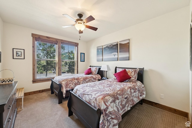 9855 Vista Dr Unit 103, Heber City, UT 84032 - bedroom featuring light colored carpet and a ceiling fan
