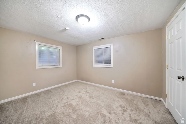 8916 S Cobble Crest Ln E, Sandy, UT 84093 - unfurnished bedroom with carpet and a textured ceiling