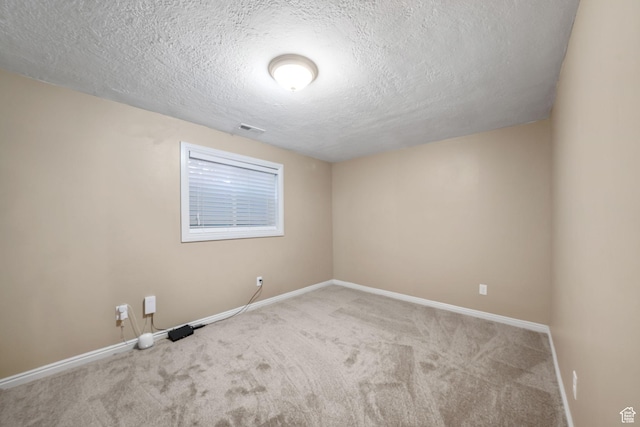 8916 S Cobble Crest Ln E, Sandy, UT 84093 - empty room with carpet floors and a textured ceiling