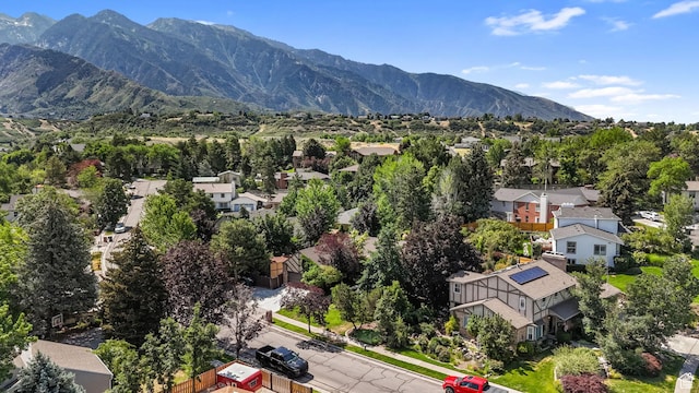 8916 S Cobble Crest Ln E, Sandy, UT 84093 - aerial view of residential area featuring a mountainous background