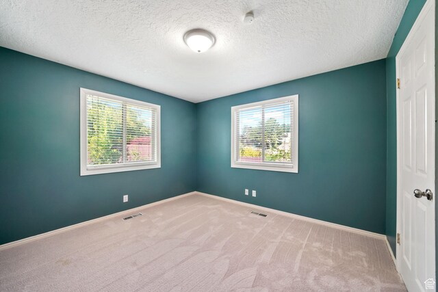 8916 S Cobble Crest Ln E, Sandy, UT 84093 - carpeted spare room with a smoke detector and a textured ceiling