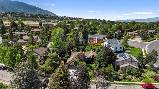 8916 S Cobble Crest Ln E, Sandy, UT 84093 - aerial view of residential area featuring a mountain backdrop