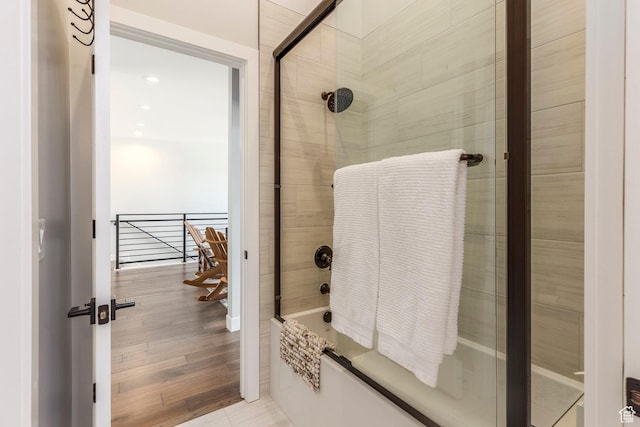 855 E Klaim Dr, Hideout, UT 84036 - full bathroom featuring combined bath / shower with glass door and wood finished floors