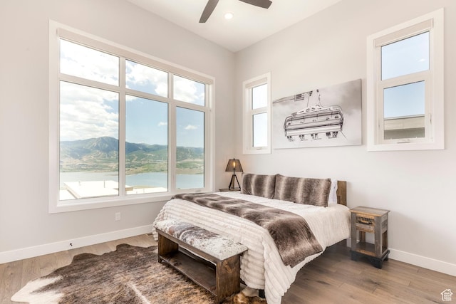 855 E Klaim Dr, Hideout, UT 84036 - bedroom with wood finished floors, a ceiling fan, and recessed lighting