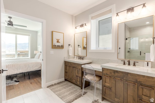 855 E Klaim Dr, Hideout, UT 84036 - full bathroom with ensuite bathroom, double vanity, a shower stall, and ceiling fan