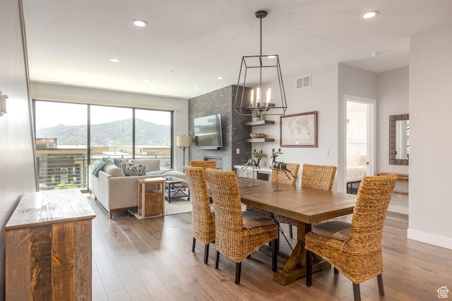 855 E Klaim Dr, Hideout, UT 84036 - dining area featuring wood finished floors, recessed lighting, and a chandelier