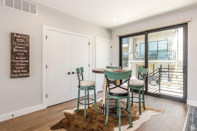 855 E Klaim Dr, Hideout, UT 84036 - dining area with wood finished floors and recessed lighting