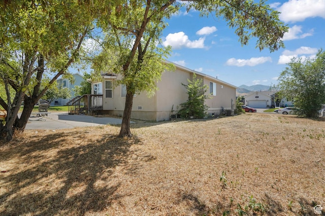 3641 S Country W Dr W, Magna, UT 84044 - view of property exterior with a residential view and crawl space