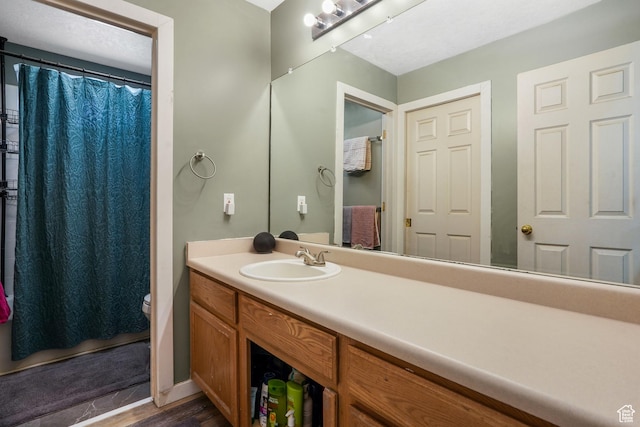 3641 S Country W Dr W, Magna, UT 84044 - bathroom with vanity, wood finished floors, and curtained shower