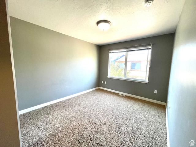 3794 W Angelica Ct, South Jordan, UT 84095 - empty room featuring carpet flooring, a smoke detector, and a textured ceiling