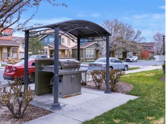3794 W Angelica Ct, South Jordan, UT 84095 - view of patio / terrace with a residential view and a grill
