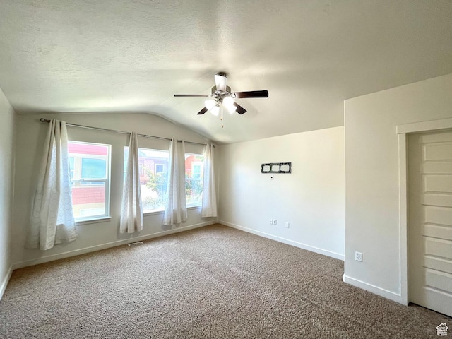 3794 W Angelica Ct, South Jordan, UT 84095 - unfurnished room featuring a ceiling fan, lofted ceiling, carpet flooring, and a textured ceiling