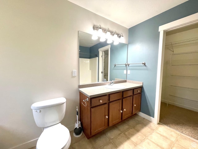 3794 W Angelica Ct, South Jordan, UT 84095 - full bathroom featuring vanity, a walk in closet, a shower, and tile patterned flooring