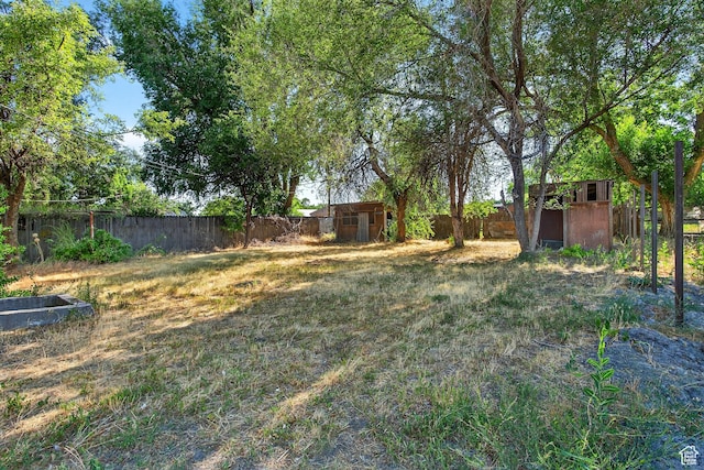 945 N 1200 W, Salt Lake City, UT 84116 - view of yard featuring a storage unit