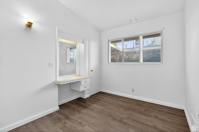945 N 1200 W, Salt Lake City, UT 84116 - unfurnished bedroom featuring dark wood-style flooring, built in study area, and vaulted ceiling