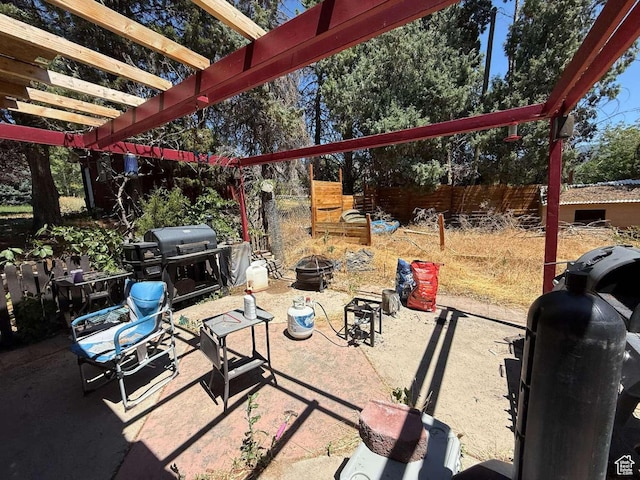 1012 W 3550 N, Pleasant View, UT 84414 - view of patio with an outdoor fire pit and area for grilling