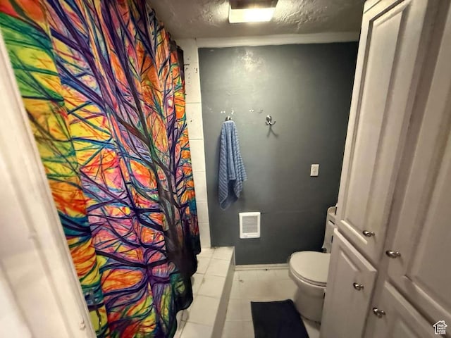 1012 W 3550 N, Pleasant View, UT 84414 - bathroom with a shower with curtain, tile patterned floors, and a textured ceiling