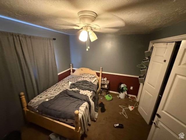 1012 W 3550 N, Pleasant View, UT 84414 - bedroom featuring a textured ceiling, ceiling fan, and carpet floors