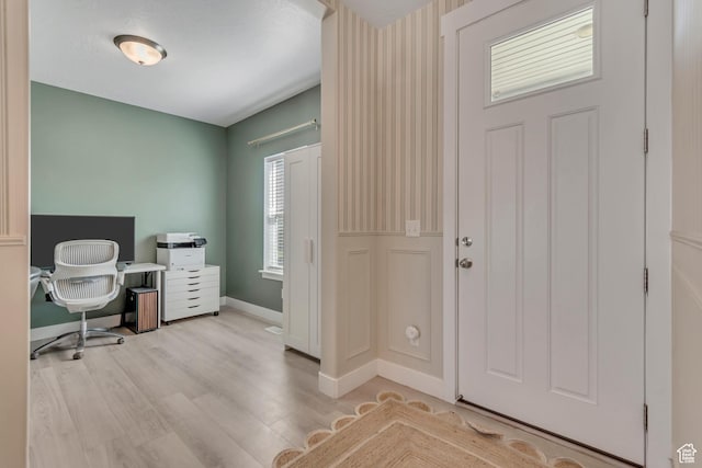 4913 E Golden Meadow Xing, Eagle Mountain, UT 84005 - entryway with baseboards and wood finished floors